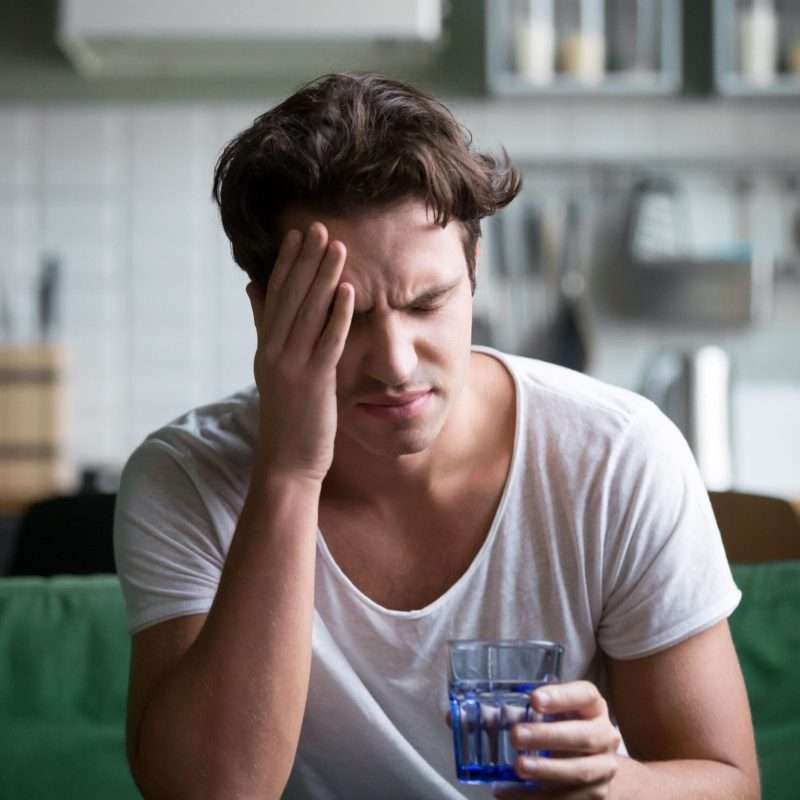 A man wondering: How long does alcohol withdrawal last?