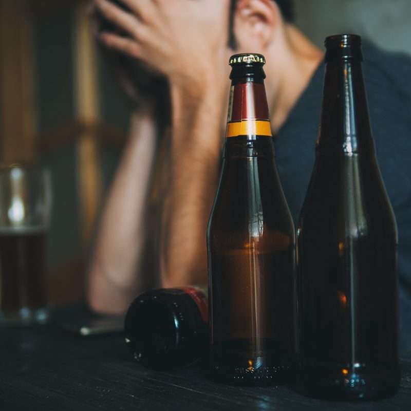 A person wondering: Is alcoholism a mental illness?