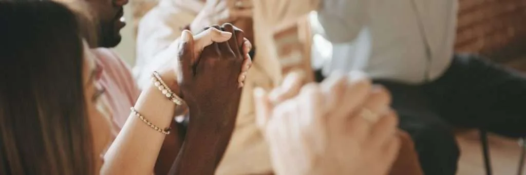 Rehab people holding hands