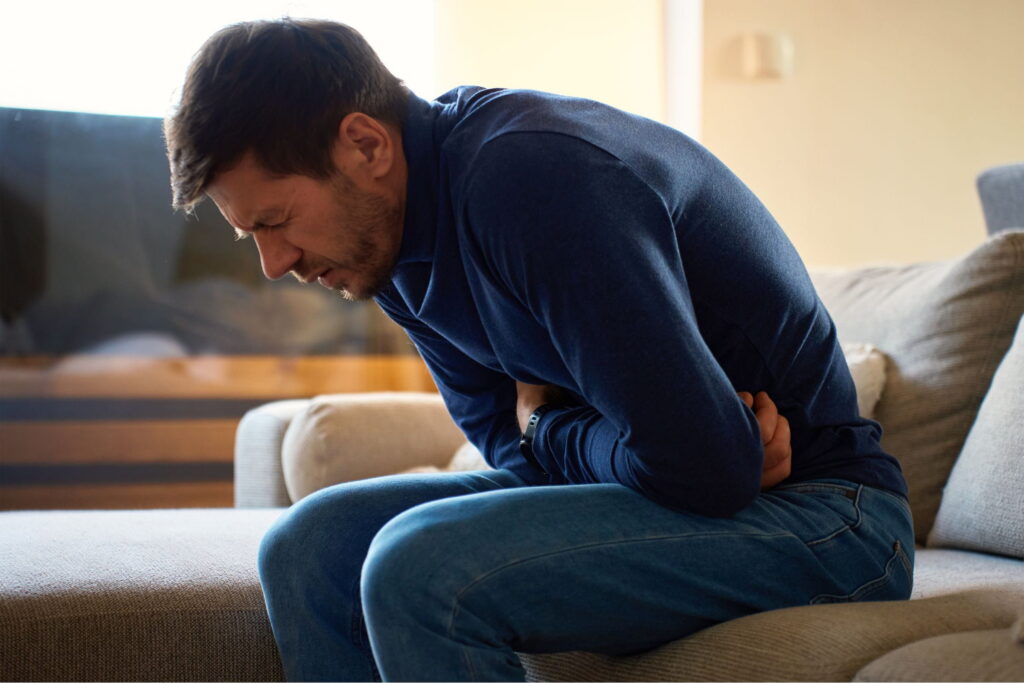man with abdominal pain from cannabinoid hyperemesis syndrome (CHS)